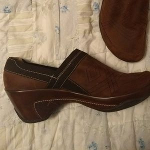 Brown leather clogs